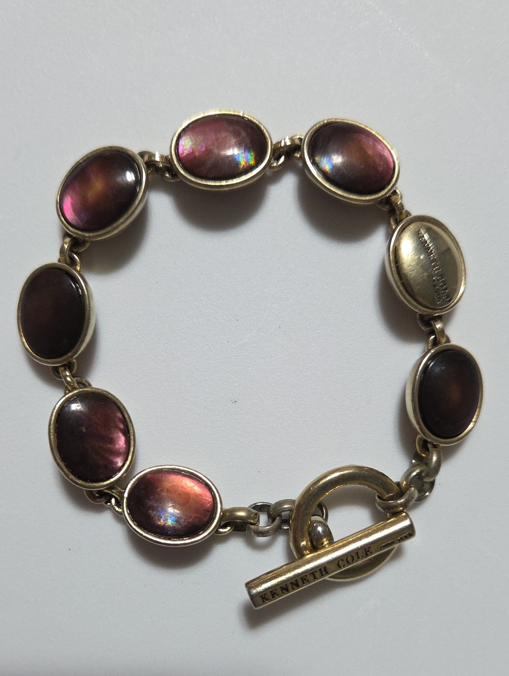 Kenneth Cole New York Gold Tone Iridescent Glass Cabochon Toggle Bracelet